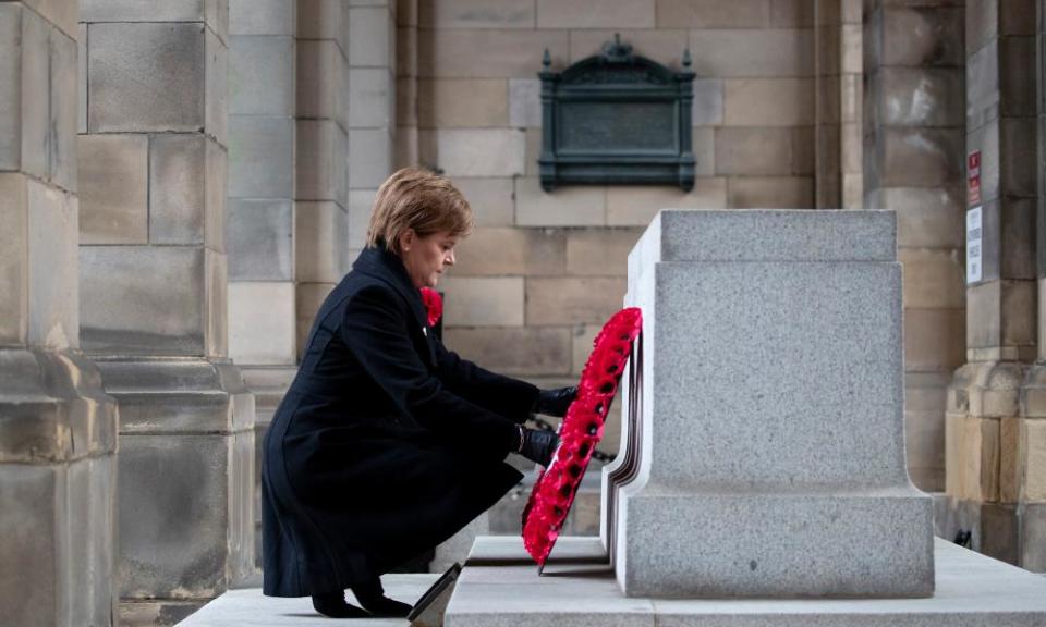 Nicola Sturgeon lays a wreath at the Stone of Remembrance at the City Chambers in Edinburgh