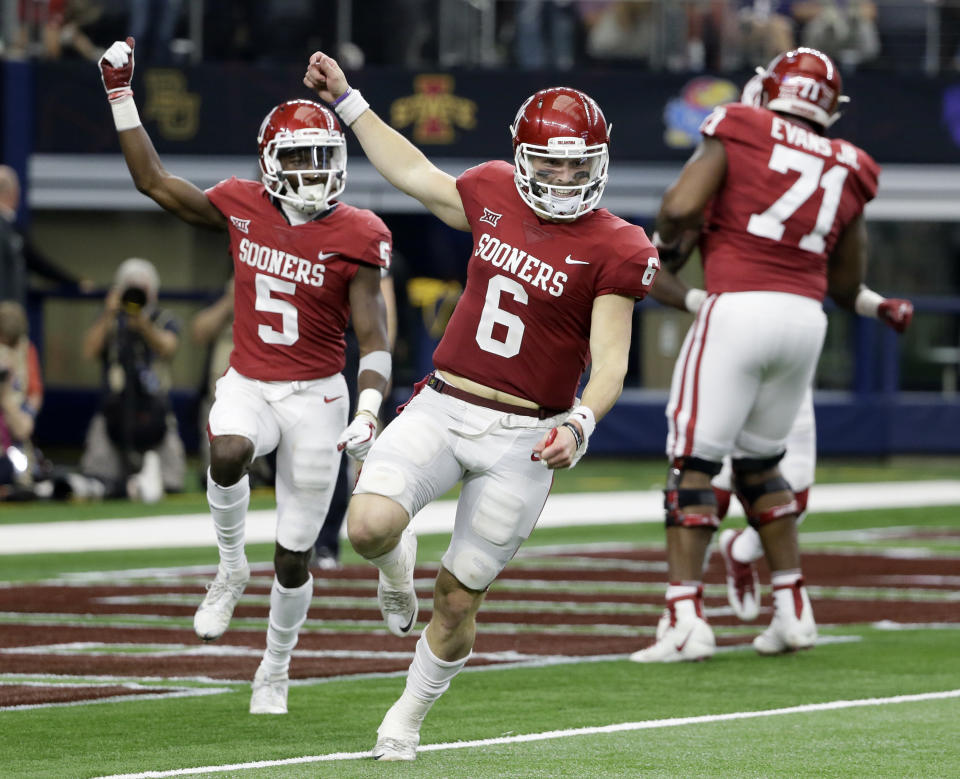 Oklahoma’s Baker Mayfield (6) and Marquise Brown (5) face a Georgia defense that is fourth nationally in scoring defense. (AP)