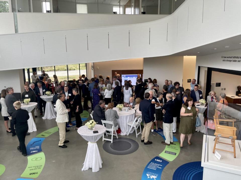 People gather in the lobby of the new Tom and Ruth Harkin Center, which will house the Harkin Institute at Drake University.