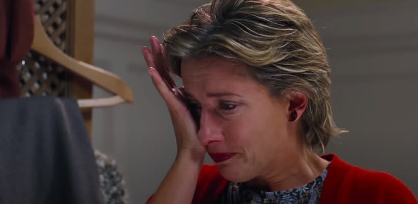 Emma Thompson's character wipes her tears away