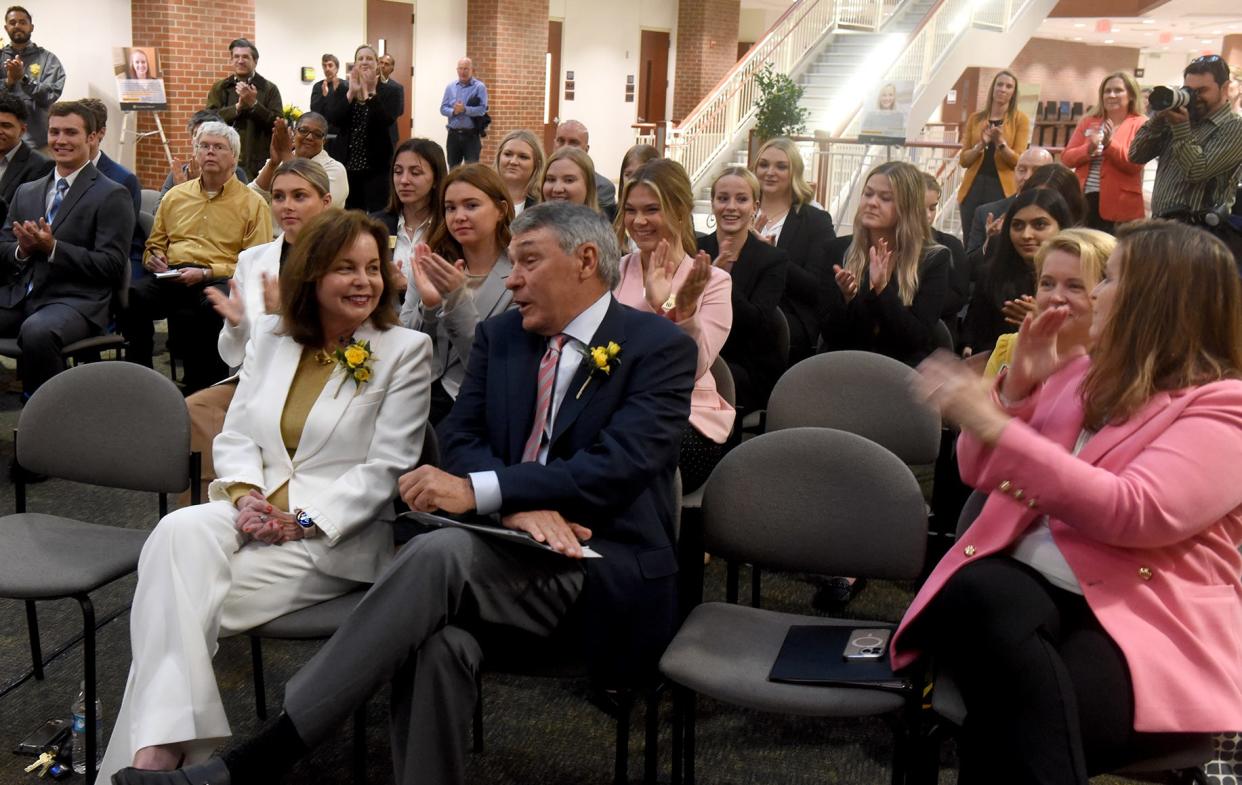 Sue and Irl Engelhardt are applauded after University of Missouri System President Mun Choi announced a $1.8 million donation from the Engelhardts to the Heartland Scholars Academy at the Robert J. Trulaske Sr. College of Business on Friday at Cornell Hall.