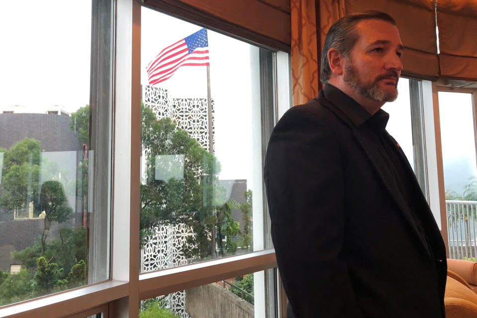 U.S. Senator Ted Cruz attends to reporters at the U.S. Consul General's House in Hong Kong, China October 12, 2019. Cruz said he wore black to show support with pro-democracy protesters in Hong Kong.  REUTERS/John Ruwitch