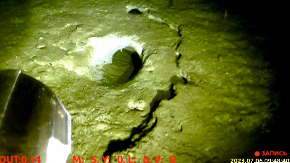  A picture taken by an underwater vehicle of a fragment of mud volcano at the bottom of Lake Baikal. 