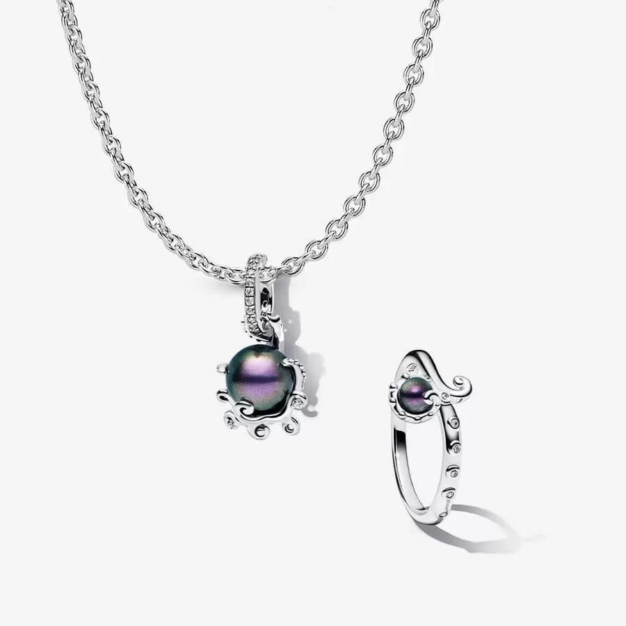 <p><a href="https://go.redirectingat.com?id=74968X1596630&url=https%3A%2F%2Fus.pandora.net%2Fen%2Fgifts%2Ffeatured-gifting%2Fgift-sets%2Fdisneys-the-little-mermaid-ursula-charm-and-ring-set%2FNAMPS0452.html%23asModule%3Dtrue%26cgid%3Ddiscover-collections-disney%26currentTeasable%3Dcom.pandora.lc3.contentbeans.PDTeaserImpl%2524%2524%255Bid%253D2374682%255D%26isFirstItemInMainPlacement%3Dfalse%26isFullWidthModule%3Dtrue%26isSFRA%3Dtrue%26moduleContext%3D%257BmoduleType%253Dm64-hero-module%252C%2520parentItems%253D%255B2374682%255D%252C%2520itemContentType%253Dm64-hero-module%252C%2520deviceData%253D%255Bdesktop%255D%257D%26seoModuleIndex%3D1%26seoPlacementIndex%3D2%26sz%3D34&sref=https%3A%2F%2F" rel="nofollow noopener" target="_blank" data-ylk="slk:Shop Now;elm:context_link;itc:0;sec:content-canvas" class="link ">Shop Now</a></p><p>The Little Mermaid Ursula Charm and Ring Set</p><p>$45.00</p><p>pandora.net</p>