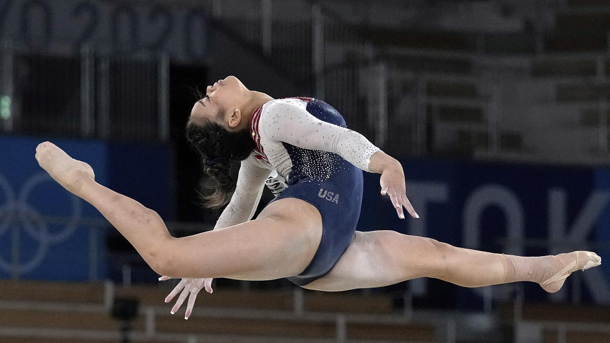 Sunisa Lee, of the United States, performs on the floor during the artistic gymnastics women's all-around final at the 2020 Summer Olympics, Thursday, July 29, 2021, in Tokyo. (AP Photo/Gregory Bull)
