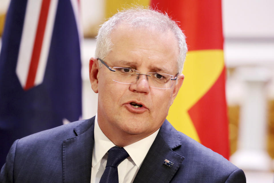 Australian Prime Minister Scott Morrison speaks at a press briefing at the Government Office in Hanoi, Friday, Aug. 23, 2019. Morrison is on an official visit to Vietnam from Aug. 22-24, 2019. (AP Photo/Duc Thanh, Pool)