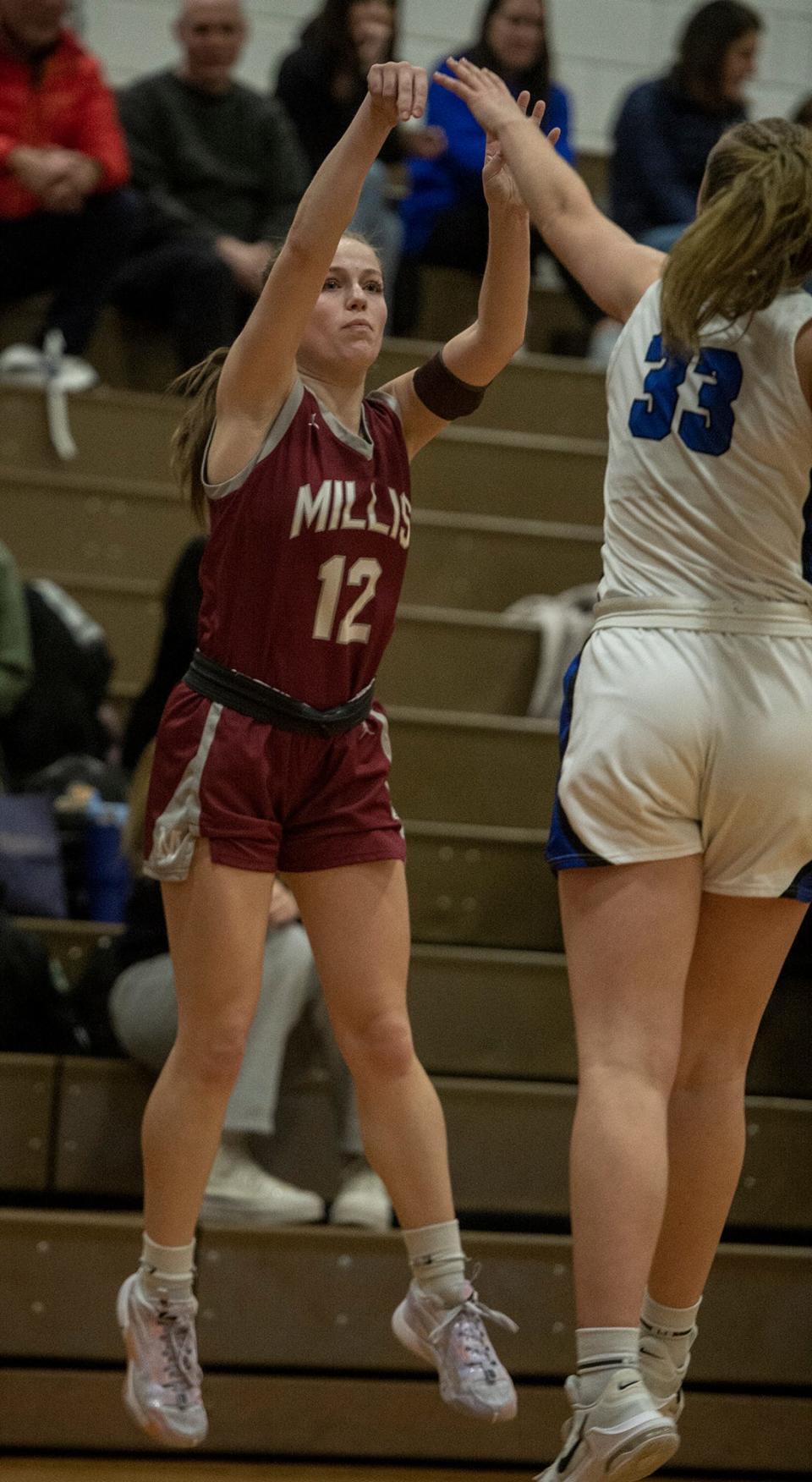Millis High School senior captain Kyra Rice with a three-pointer against Dover-Sherborn Regional High School , Feb. 2, 2024.