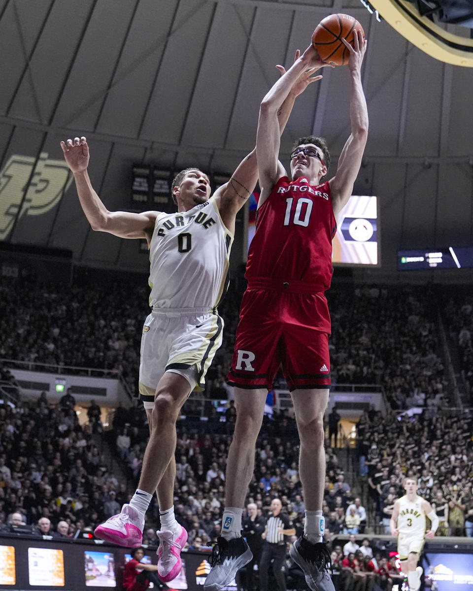 Rutgers guard Gavin Griffiths (10) shoots over Purdue forward Mason Gillis (0) during the first half of an NCAA college basketball game in West Lafayette, Ind., Thursday, Feb. 22, 2024. (AP Photo/Michael Conroy)