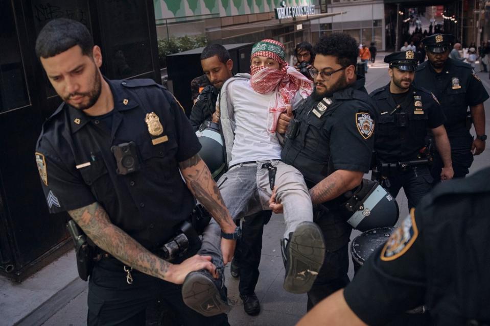 At least 48 people were nabbed by cops, but later released, amid the protests. AP