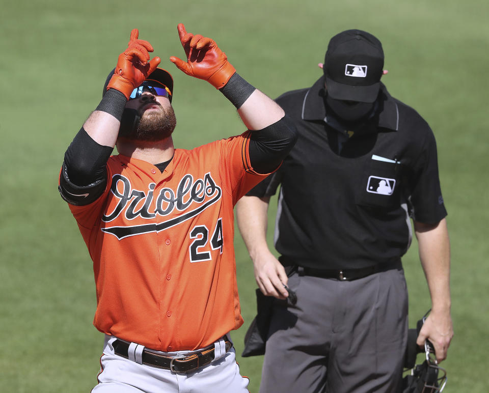 Baltimore Orioles' DJ Stewart reacts after hitting a solo home run against the Atlanta Braves during the fourth inning of a spring baseball game at CoolToday Park in North Port, Fla., Wednesday, March 3, 2021. (Curtis Compton/Atlanta Journal-Constitution via AP)