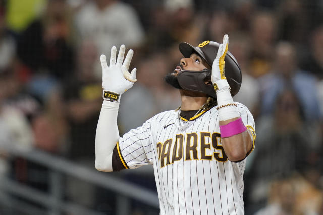 San Diego Padres catcher Victor Caratini throws to first for the out on San  Francisco Giants' LaMonte Wade Jr. during the second inning of a baseball  game Wednesday, Sept. 22, 2021, in