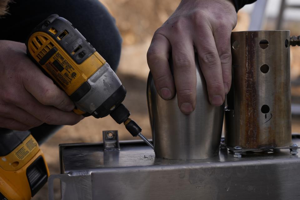 Cloud seeding equipment is installed Saturday, Dec. 3, 2022, in Lyons, Colo. The technique to get clouds to produce more snow is being used more as the Rocky Mountain region struggles with a two-decade drought. (AP Photo/Brittany Peterson)