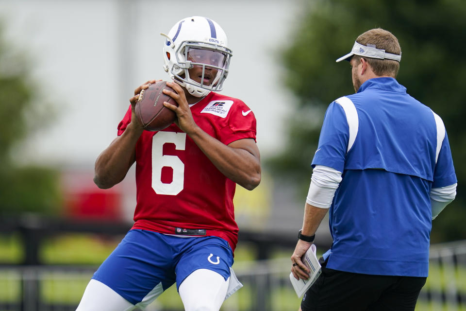 Indianapolis Colts quarterback Jalen Morton throws during practice at the NFL team's football training camp in Westfield, Ind., Saturday, July 31, 2021. (AP Photo/Michael Conroy)