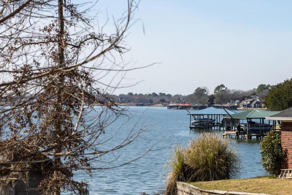 Waterfront houses on Lake Livingston are located minutes away from the Polunsky Unit on Jan. 31, 2024. Houses include docks for boats and other lake activities.