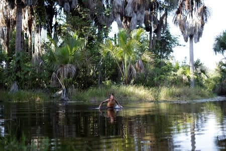 The Wider Image: Fighting fire with fire, Amazon 'forest guardians' stalk loggers