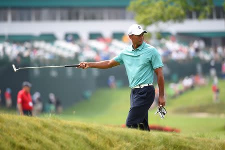 White Sulphur Springs, WV, USA; Tiger Woods on the 17th green at The Old White TPC. Mandatory Credit: Bob Donnan-USA TODAY Sports