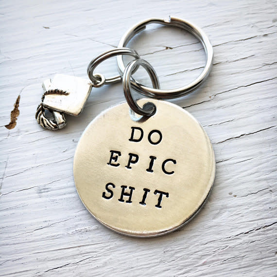 Get it on <a href="https://www.etsy.com/listing/506493314/do-epic-shit-keychain-gift-for-grad?ga_order=most_relevant&amp;ga_search_type=all&amp;ga_view_type=gallery&amp;ga_search_query=graduation%20gift&amp;ref=sr_gallery-1-35" target="_blank">Etsy</a>.