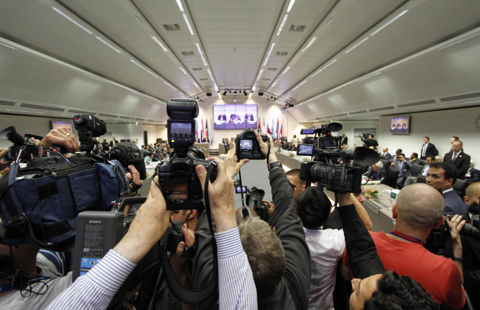 General view with media prior to the meeting of oil ministers of the Organization of the Petroleum Exporting countries, OPEC, at their headquarters Austria, on Thursday, June 14, 2012. The meeting of the 12 oil ministers of the OPEC focuses on price and production targets. (AP Photo/Ronald Zak)