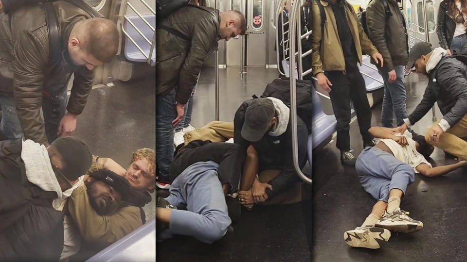 A man is restrained on a New York subway. 