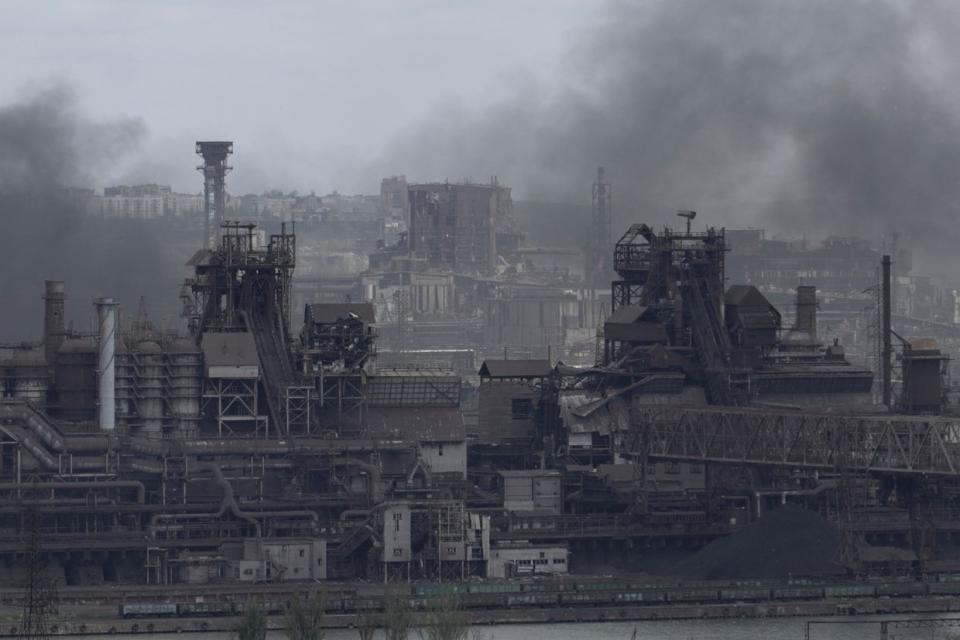 Smoke rises from the Azovstal steel plant in the city of Mariupol on May 10, 2022, amid the ongoing Russian war in Ukraine. (Stringer/AFP via Getty Images)