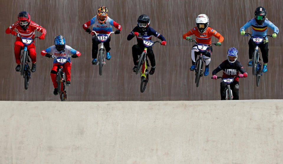 <p>Cyclists compete in the second semi-final of the BMX European Championship in Glasgow. (Reuters) </p>