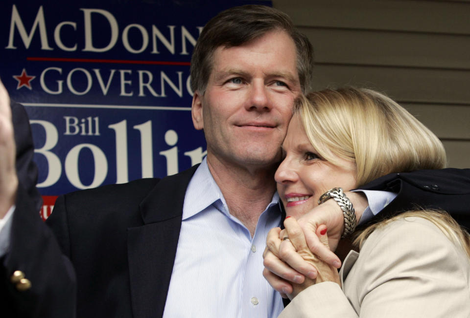 FILE- In this Oct. 31, 2009 file photo, Republican gubernatorial candidate Bob McDonnell, hugs his wife, Maureen, during a rally in Richmond, Va., McDonnell and his wife were indicted Tuesday, Jan. 21, 2014, on corruption charges after a monthslong federal investigation into gifts the Republican received from a political donor. (AP Photo/Steve Helber, File)