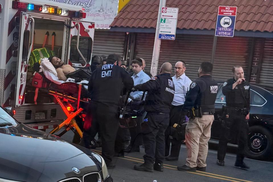 Suspected cop killer Guy Rivera being placed in an ambulance Monday, March 26, 2024.