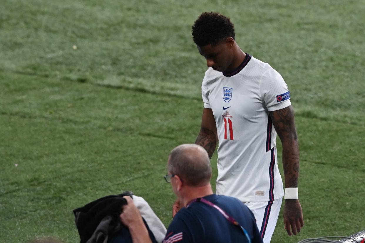 England's forward Marcus Rashford leaves the pitch after their loss in the UEFA EURO 2020 final football match between Italy and England at the Wembley Stadium in London on July 11, 2021. (Photo by FACUNDO ARRIZABALAGA / POOL / AFP) (Photo by FACUNDO ARRIZABALAGA/POOL/AFP via Getty Images)