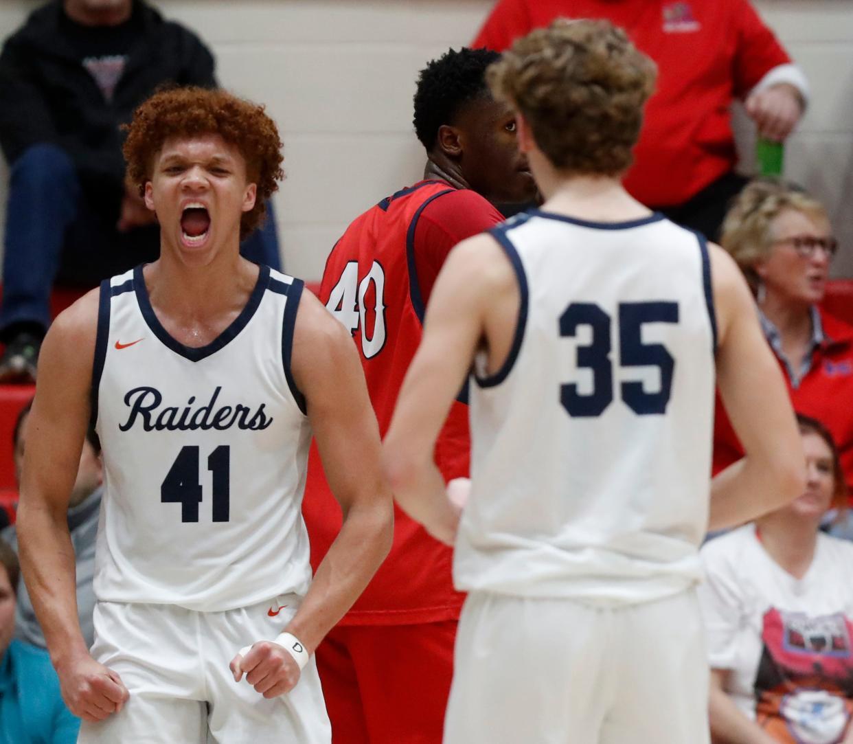 Harrison Raiders forward Malachi King (41) celebrates after scoring during the IHSAA boy’s basketball sectional game against the Kokomo Wildkats, Tuesday, Feb. 27, 2024, at Lafayette Jeff High School in Lafayette, Ind.