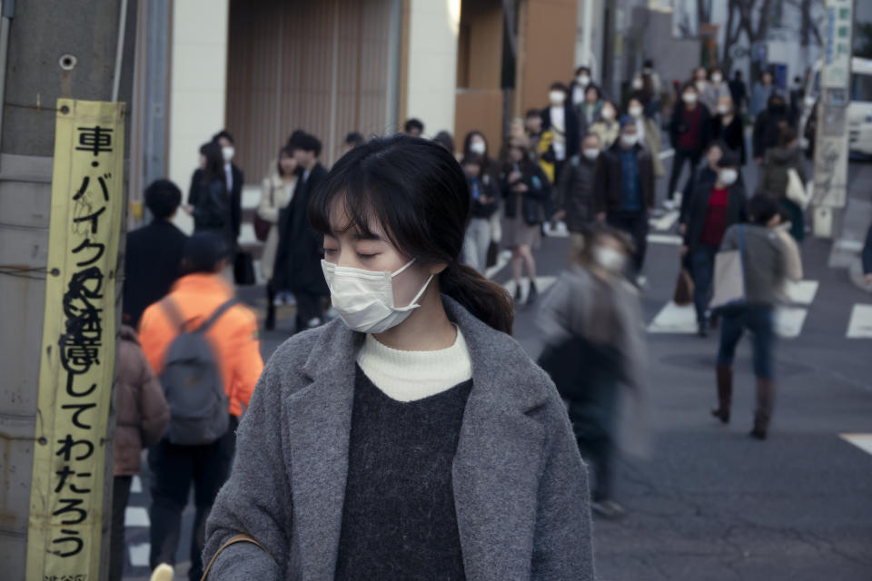 Wearing a face mask on the street / in public is not an unusual thing in Japan. Especially in winter or pollen season. Also, many people believe masks can protect themselves from infectious disease.