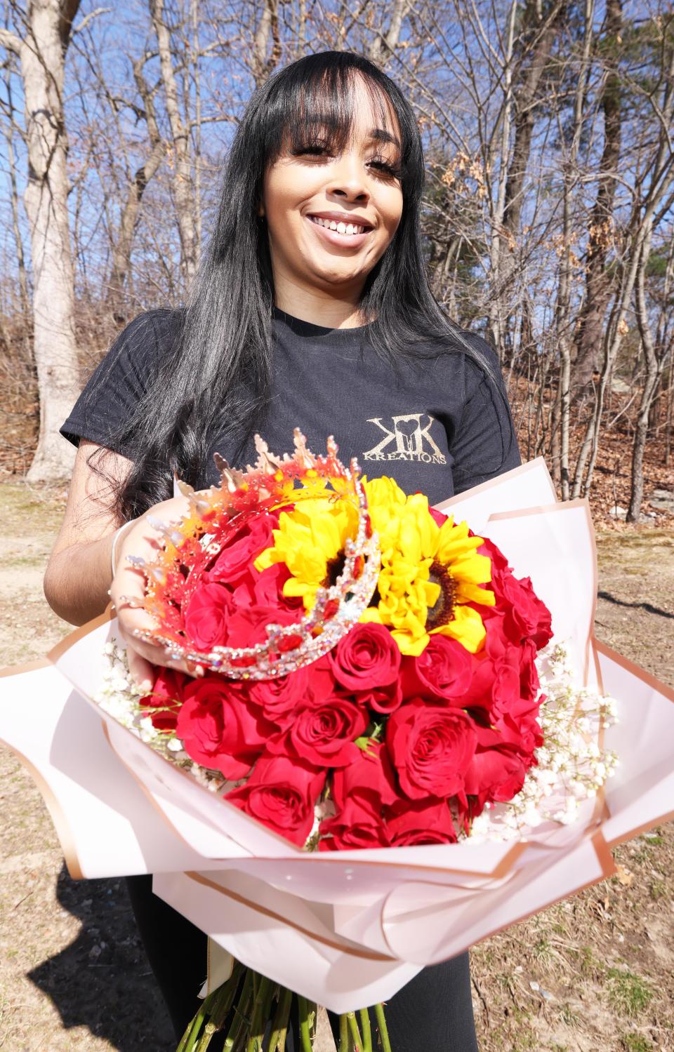 Kianna Marques designs items at her Brockton home on Wednesday, March 13, 2024.