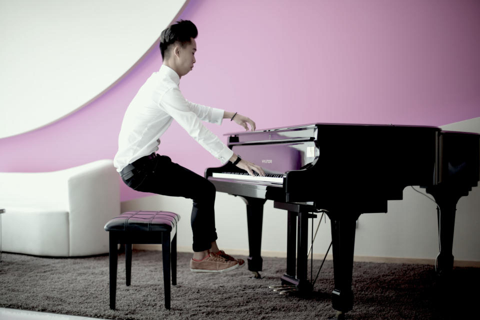 Calling the tune: A pianist floats around his instrument. (Levitation SG/ Rex Features)