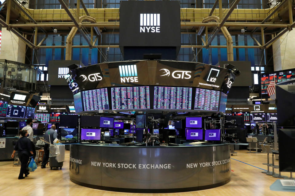 A nearly empty trading floor is seen as preparations are made for the return to trading at the New York Stock Exchange (NYSE) in New York, U.S., May 22, 2020. REUTERS/Brendan McDermid