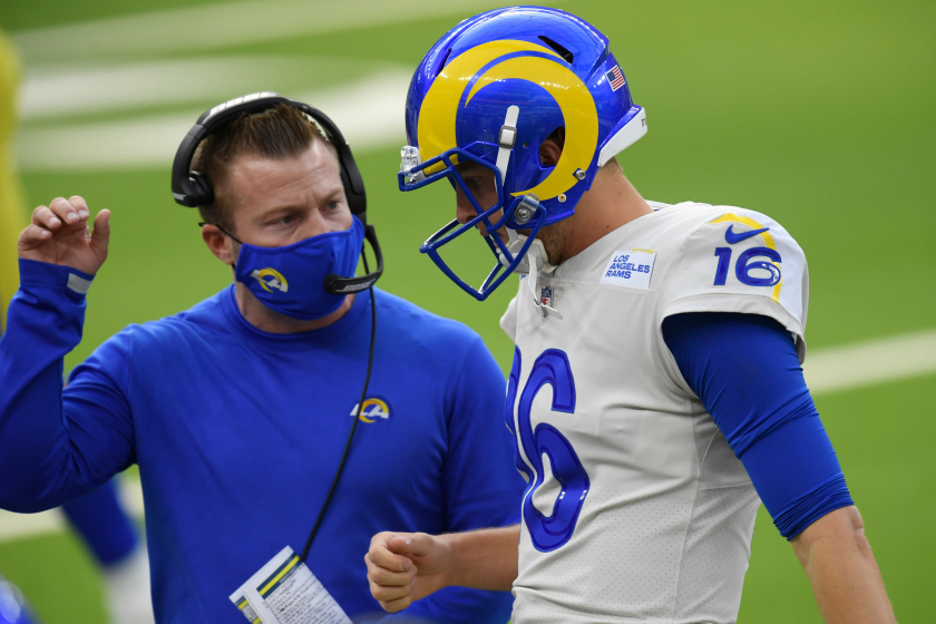 INGLEWOOD, CALIFORNIA - DECEMBER 20: Head coach Sean McVay speaks with Jared Goff.