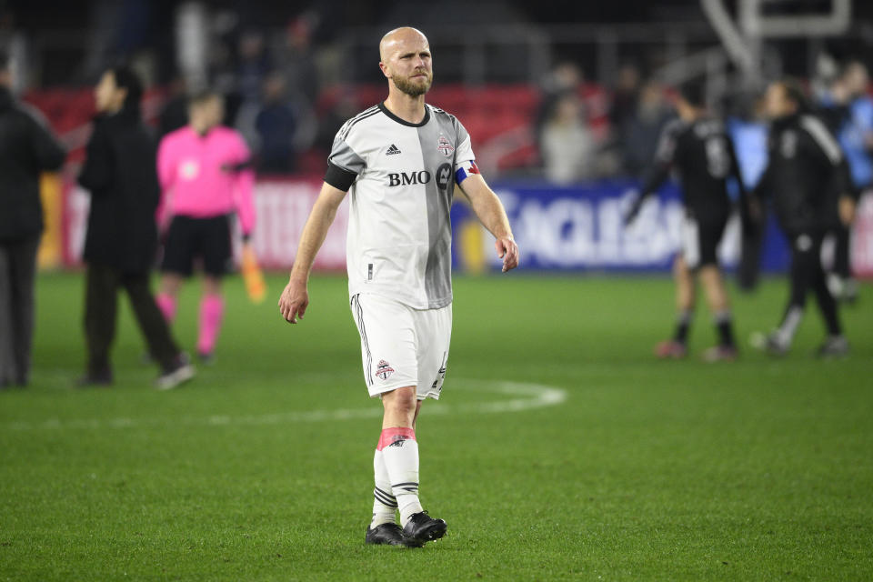 Toronto FC midfielder Michael Bradley leaves the field after an MLS soccer match against D.C. United, Saturday, Feb. 25, 2023, in Washington. (AP Photo/Nick Wass)