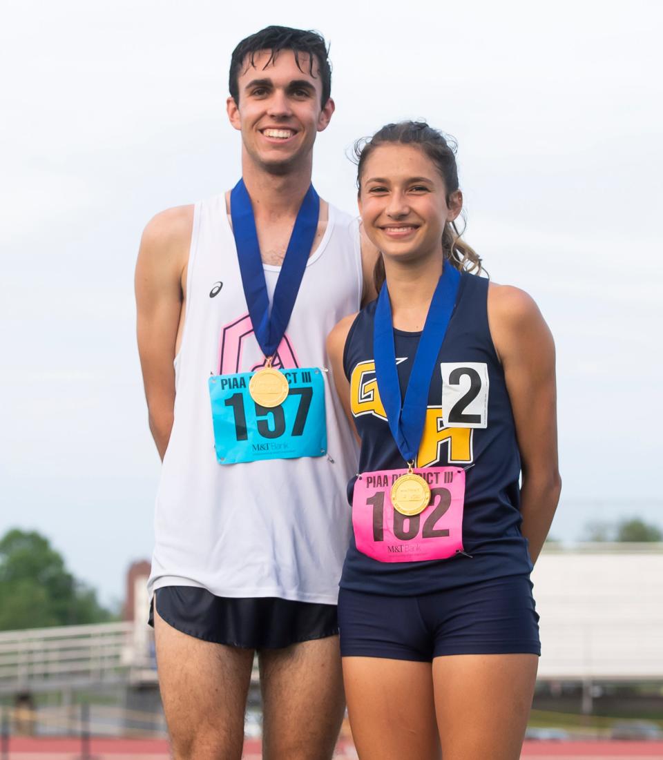 Greencastle-Antrim senior Weber Long and sophomore Claire Paci pose for a photo together after each of them won their respective race in the 3,200-meter run at the PIAA District 3 Track and Field Championships on Friday, May 20, 2022, at Shippensburg University.