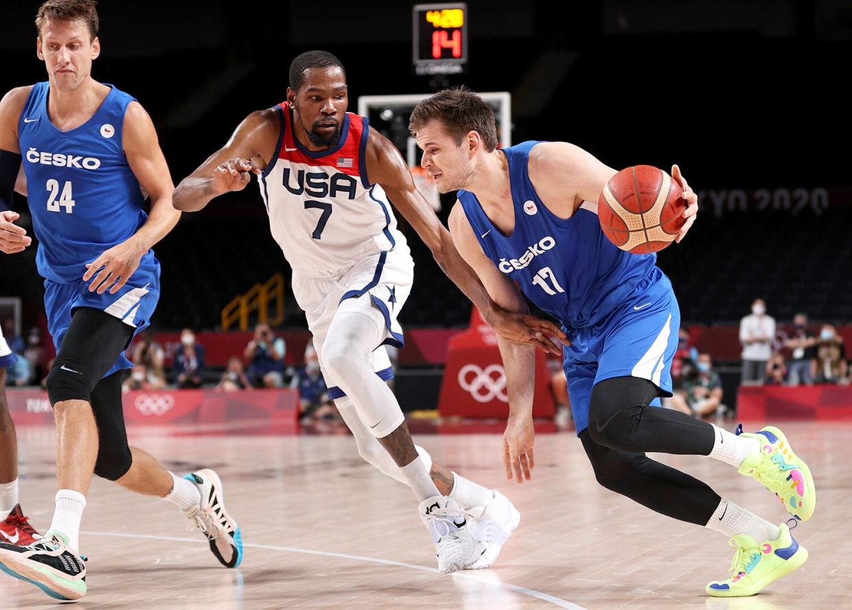 Jaromir Bohacik #17 of Team Czech Republic drives to the basket against Kevin Durant #7 of Team United States during the first half of a Men's Basketball Preliminary Round Group A game on day eight of the Tokyo 2020 Olympic Games at Saitama Super Arena on July 31, 2021 in Saitama, Japan.