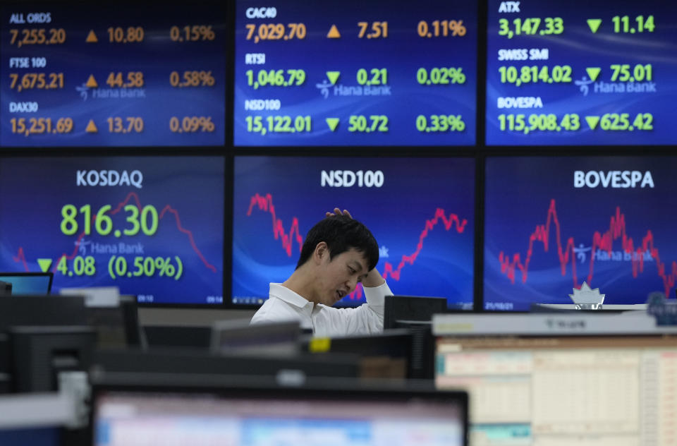 A currency trader watches monitors at the foreign exchange dealing room of the KEB Hana Bank headquarters in Seoul, South Korea, Wednesday, Oct. 18, 2023. (AP Photo/Ahn Young-joon)