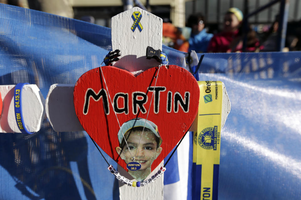 A memorial to 2013 Boston Marathon bombing victim Martin Richard sits near the starting line of the 118th Boston Marathon Monday, April 21, 2014 in Boston. (AP Photo/Robert F. Bukaty)