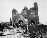 FILE - In this Sept. 13, 1945, file photo, the Urakami Catholic Cathedral in Nagasaki, Japan, stands waste in the aftermath of the detonation of the atom bomb over a month ago over this city. The city of Nagasaki in southern Japan marks the 75th anniversary of the U.S. atomic bombing of Aug. 9, 1945. It was a second nuclear bomb dropped by the U.S. three days after it made the world’s first atomic attack on Hiroshima. Japan surrendered on Aug. 15, ending World War II and its nearly a half-century aggression toward Asian neighbors. Dwindling survivors, whose average age exceeds 83, increasingly worry about passing their lessons on to younger generations.(AP Photo/Stanley Troutman, Pool, File)