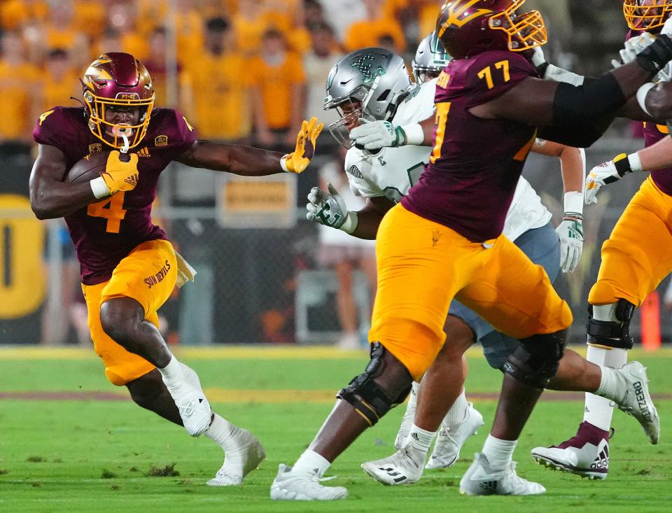 ASU running back Daniyel Ngata (4) runs against Eastern Michigan during a game at Sun Devil Stadium in Tempe on Sept. 17, 2022.