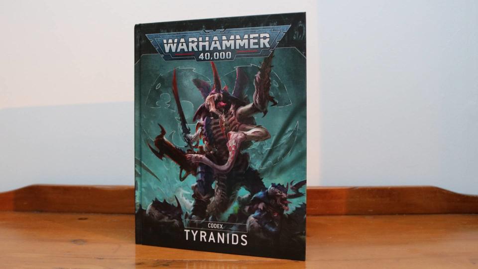 The Tyranid Codex on a wooden table