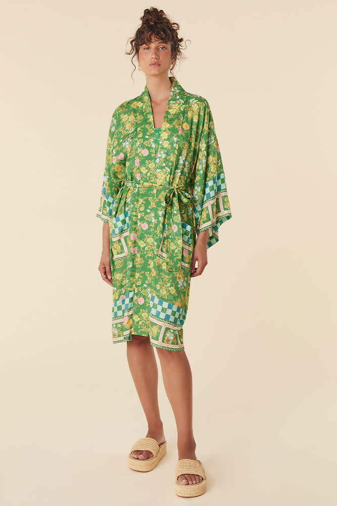 <p><a href="https://usa.spell.co/collections/robes/products/flora-midi-robe-citrus-crush" rel="nofollow noopener" target="_blank" data-ylk="slk:Shop Now;elm:context_link;itc:0;sec:content-canvas" class="link rapid-noclick-resp">Shop Now</a></p><p>Flora Midi Robe</p><p>spell.co</p><p>$259.00</p><span class="copyright">Spell</span>