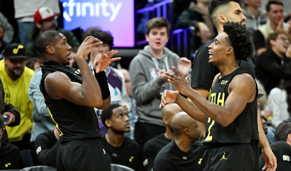 Utah Jazz guard Kris Dunn (11) and Utah Jazz guard Collin Sexton (2) enjoy themselves on the bench as the Jazz and Raptors play at the Delta Center in Salt Lake City on Friday, Jan. 12, 2024. Utah won 145-113. | Scott G Winterton, Deseret News