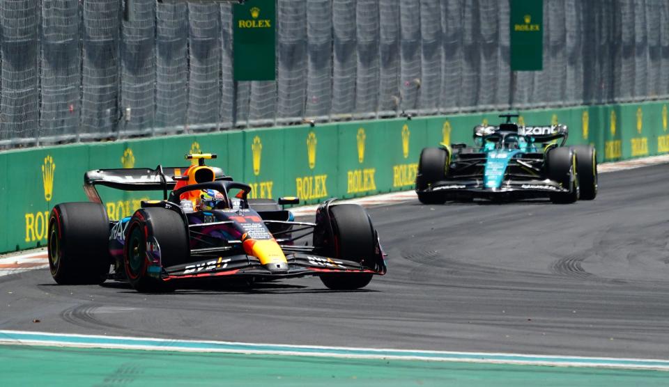 May 6, 2023; Miami Gardens, Florida, USA;  Red Bull driver Sergio Perez (11) of Mexico races during the third practice for the Miami Grand Prix at Miami International Autodrome.