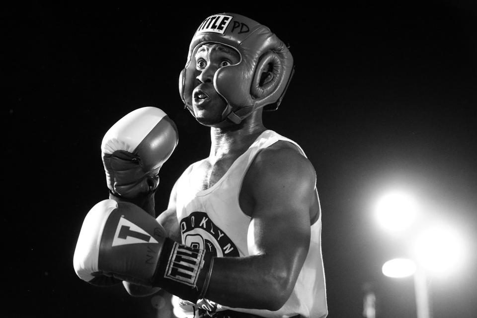 <p>NYPD police officer Rashawn Merrick faces opponent Savvas Tjortjoglou in a grudge match at the Brooklyn Smoker in the parking lot of Gargiulo’s Italian restaurant in Coney Island, Brooklyn, on Aug. 24, 2017. (Photo: Gordon Donovan/Yahoo News) </p>