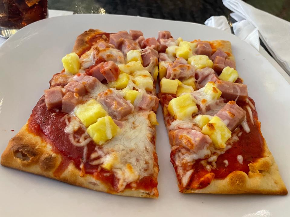 Paradise Que is a North Knoxville restaurant that serves traditional barbecue dishes with a Hawaiian twist, such as the Hawaiian mini pizzas, topped with diced SPAM and pineapple as well as tomato sauce and mozzarella cheese.