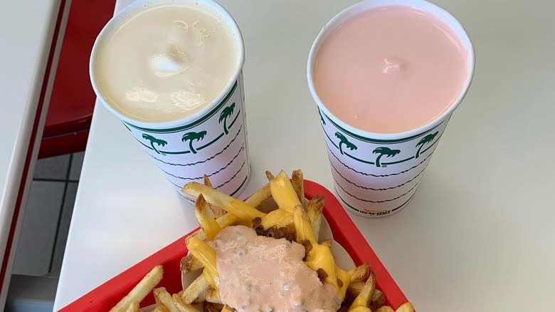 In-N-Out vanilla and strawberry milkshakes