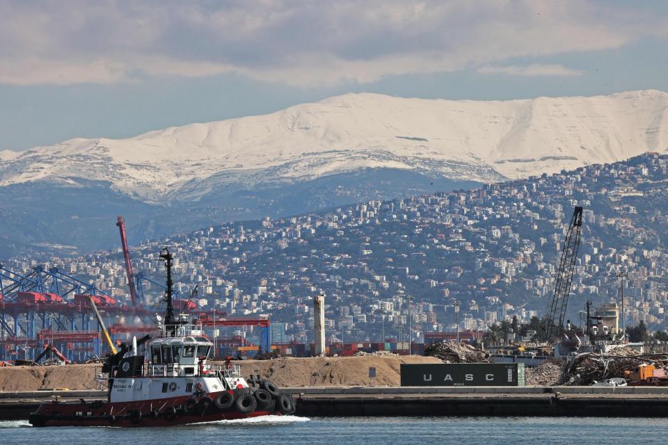 Beirut's port with the snow-covered Mount Lebanon mountain range in the back