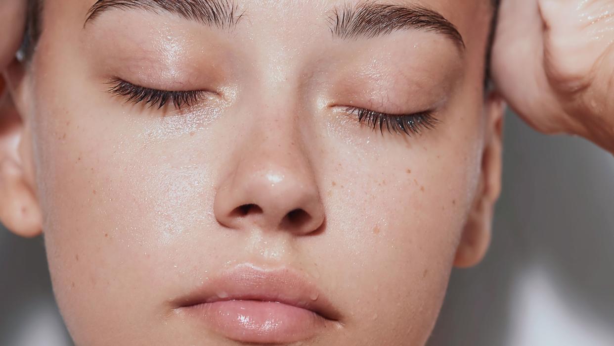 woman with steam on face